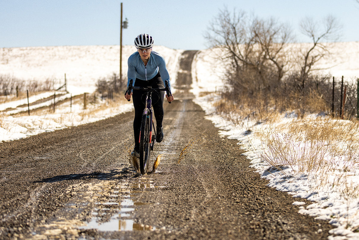 Biker Riding Gravel Bike on Trail
